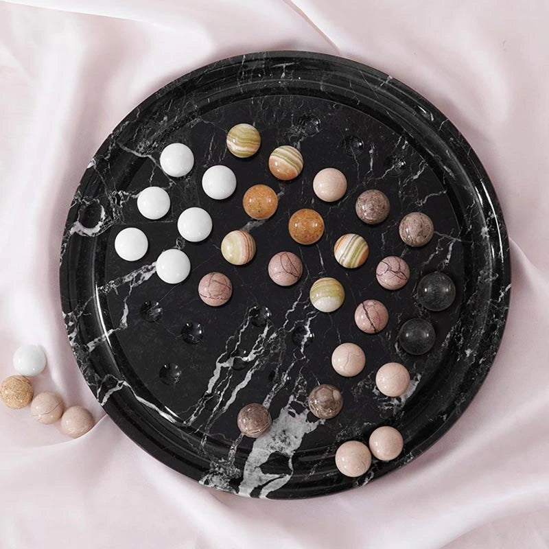 Black Peg Solitaire Game