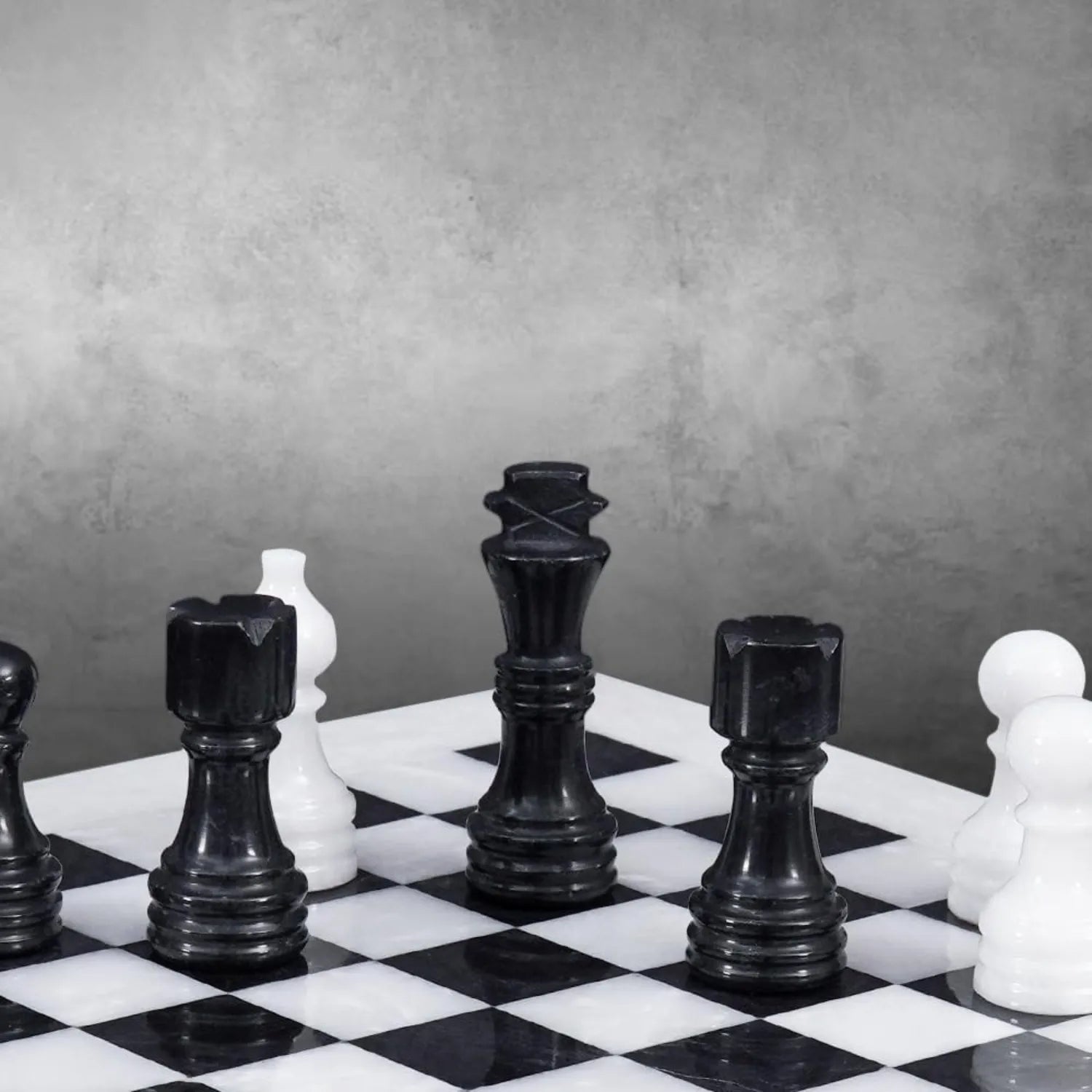 marble chess pieces white and black