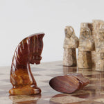red and coral chess pieces