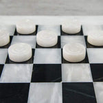 White and Black Marble Checkers piece