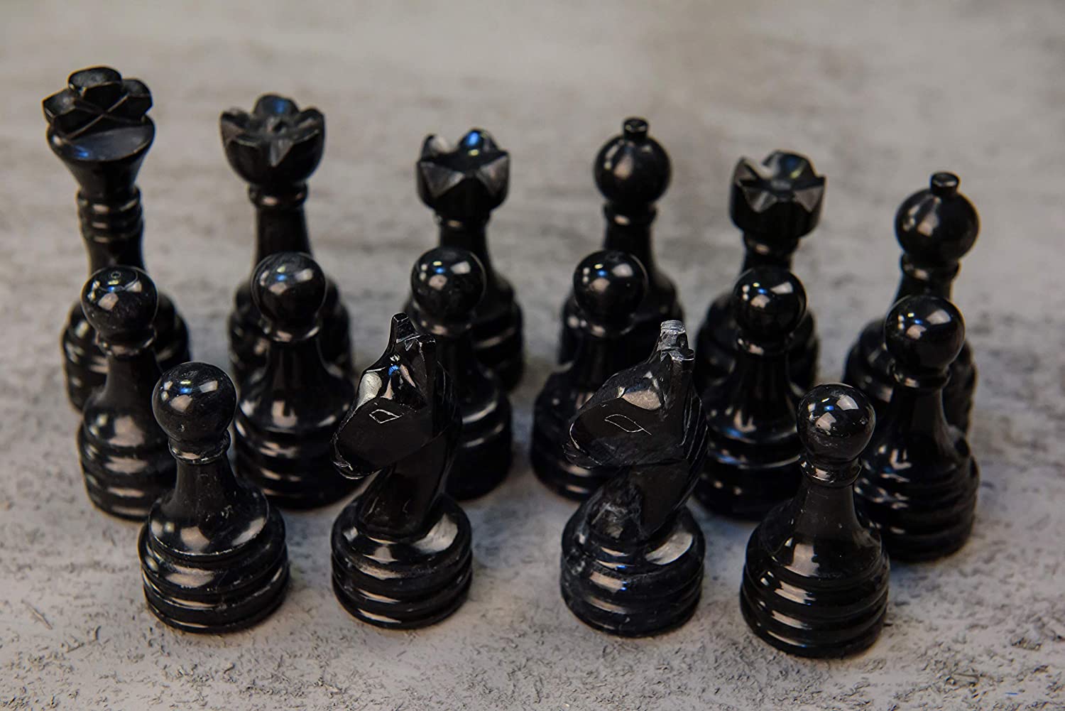 Black and Coral chess pieces
