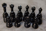 Black and Coral chess pieces