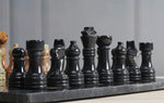 Black & Multi Green chess pieces