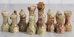 Black & Multi Green chess pieces